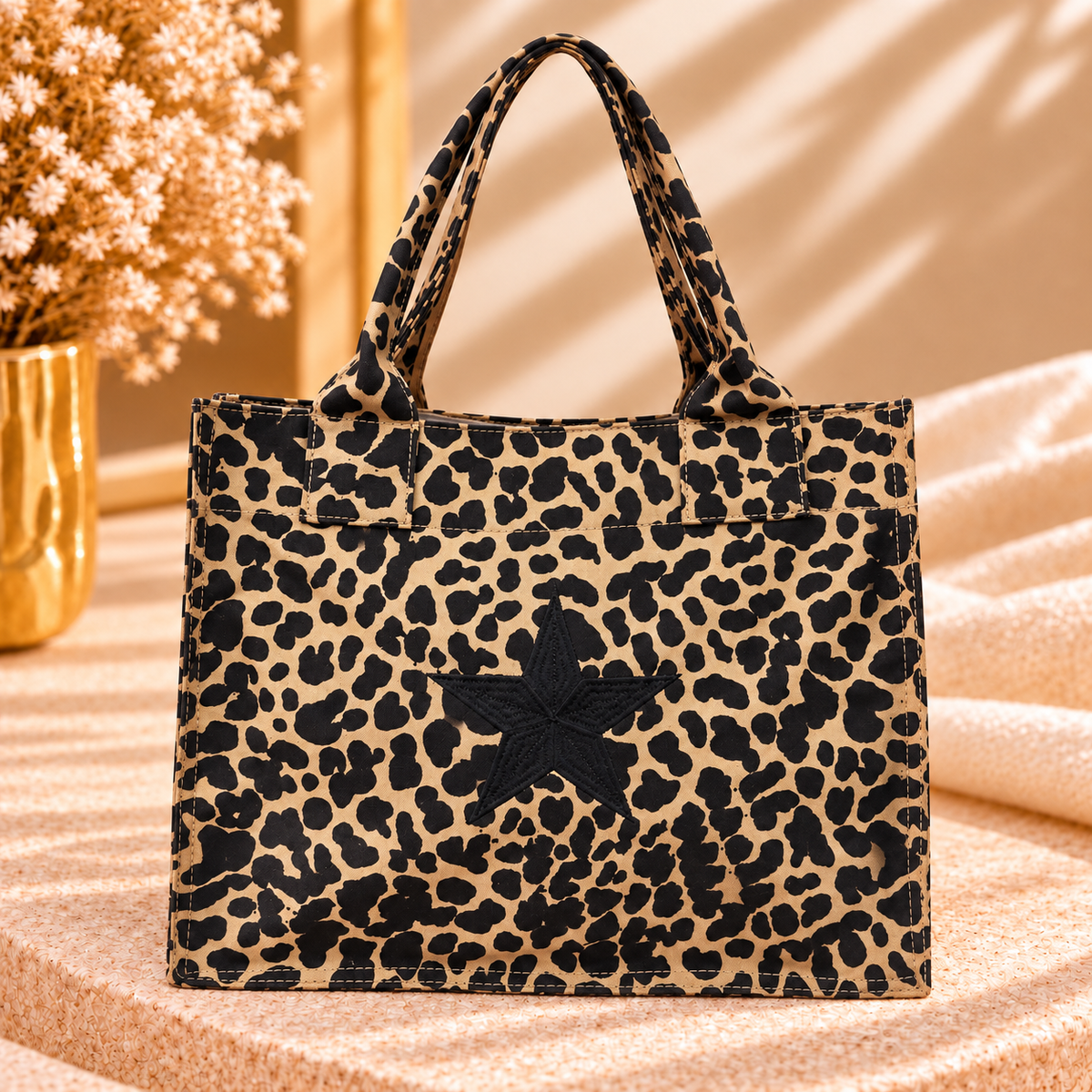 Bolso tote animal print con estrella negra