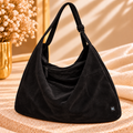 Bolso de gamuza negro con correa regulable